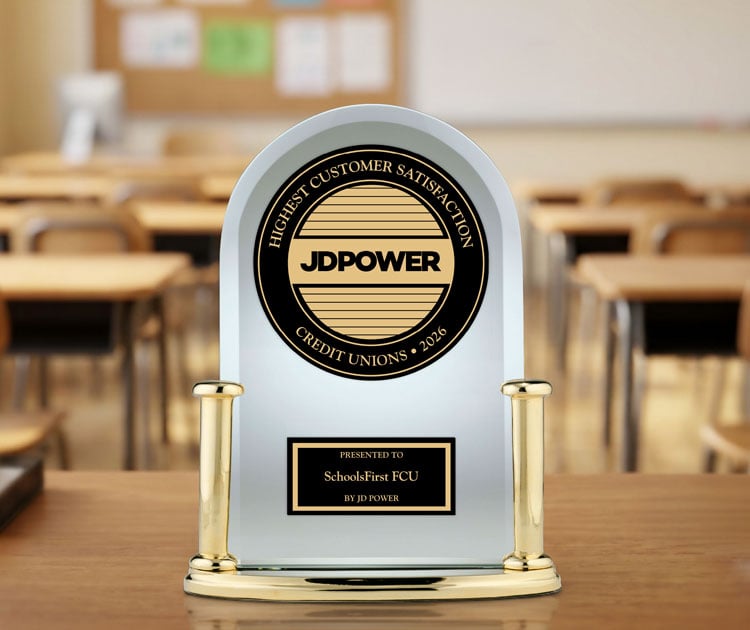 Picture of a J.D. Power trophy awarded to SchoolsFirst FCU.