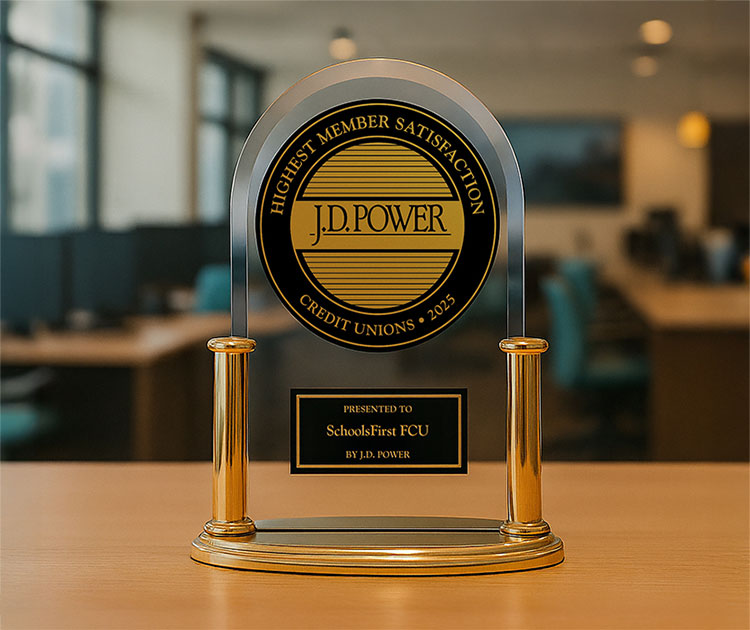 Picture of a J.D. Power trophy awarded to SchoolsFirst FCU.