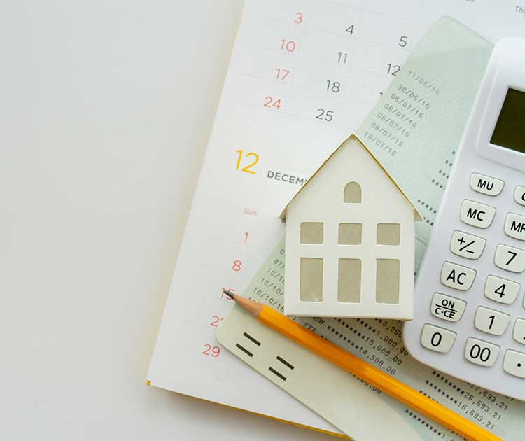 Close up top view group of calculator, home model, yellow pencil, banking account book and calendar on white color background.